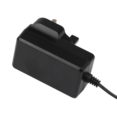 Bộ chuyển đổi Ac Dc Đầu ra 24v được chứng nhận IEC61558 với phích cắm của Anh cho máy lọc không khí