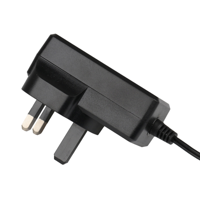 Bộ chuyển đổi Ac Dc Đầu ra 24v được chứng nhận IEC61558 với phích cắm của Anh cho máy lọc không khí